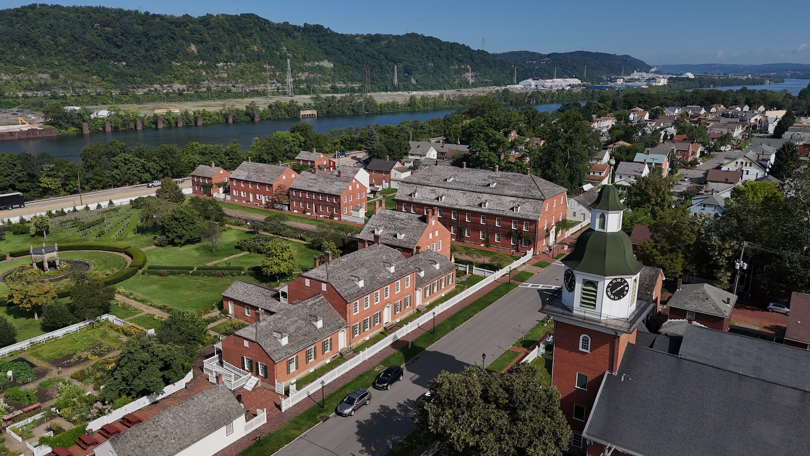 An,Aerial,Establishing,Shot,Of,The,Small,Pennsylvania,Town,Of An aerial establishing shot of the small Pennsylvania town of Ambridge, Beaver County. Ohio River in the distance, small church in the foreground. Pittsburgh suburbs.